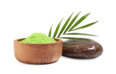 Photo of Green sea salt in bowl, palm leaf and spa stone isolated on white
