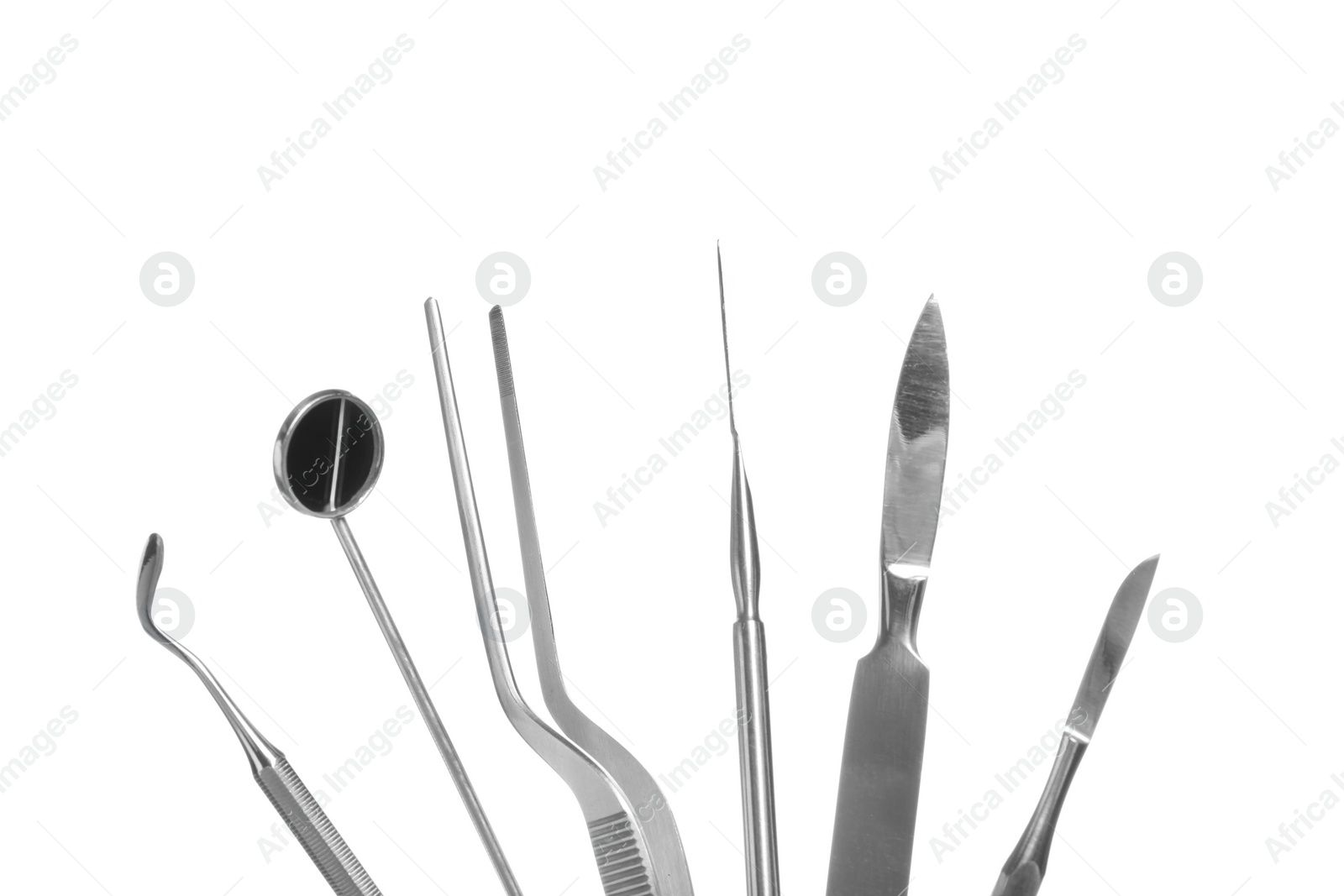 Photo of Professional dental tools isolated on white. Mouth and teeth care