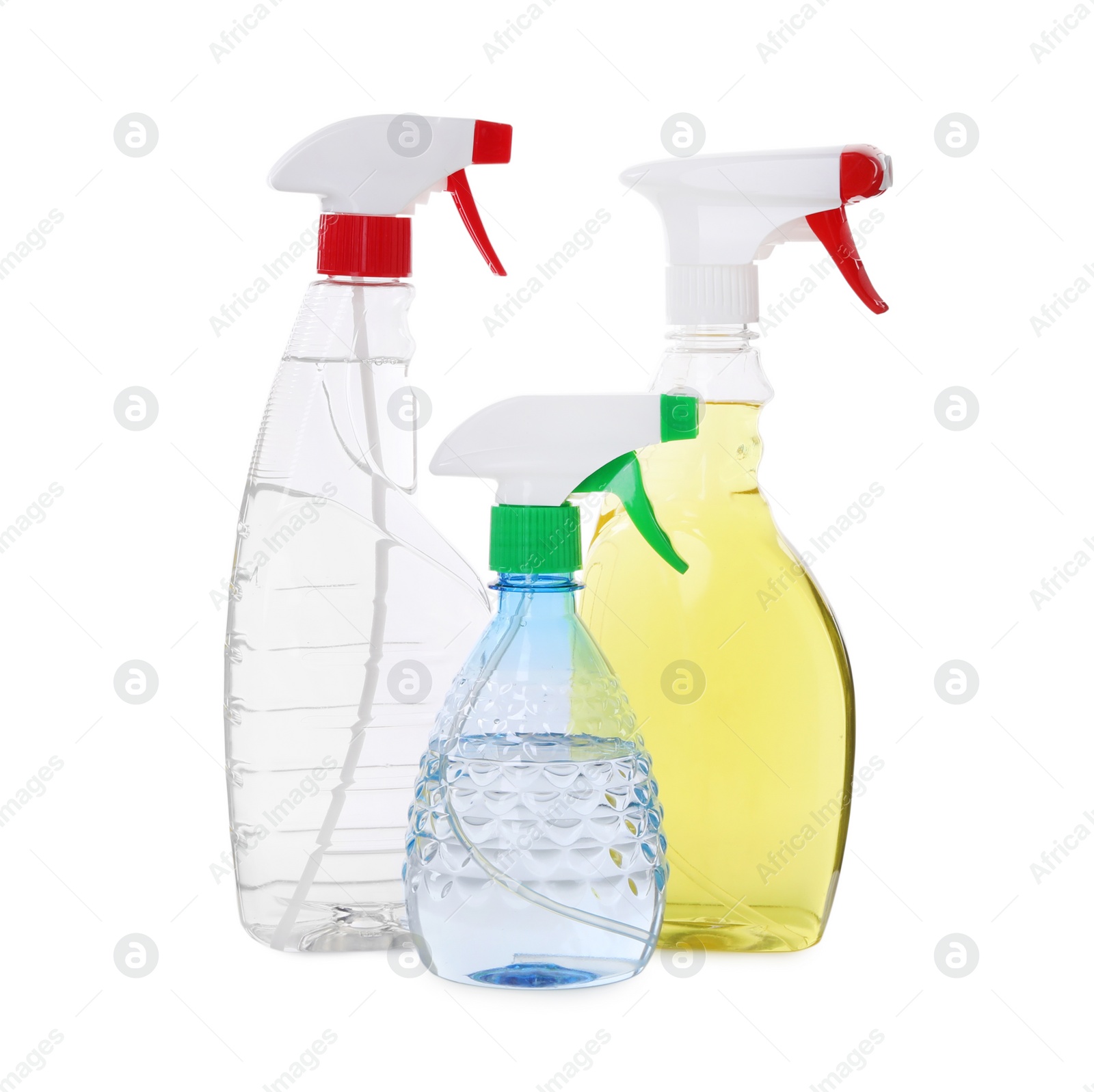 Photo of Plastic spray bottles with liquid isolated on white