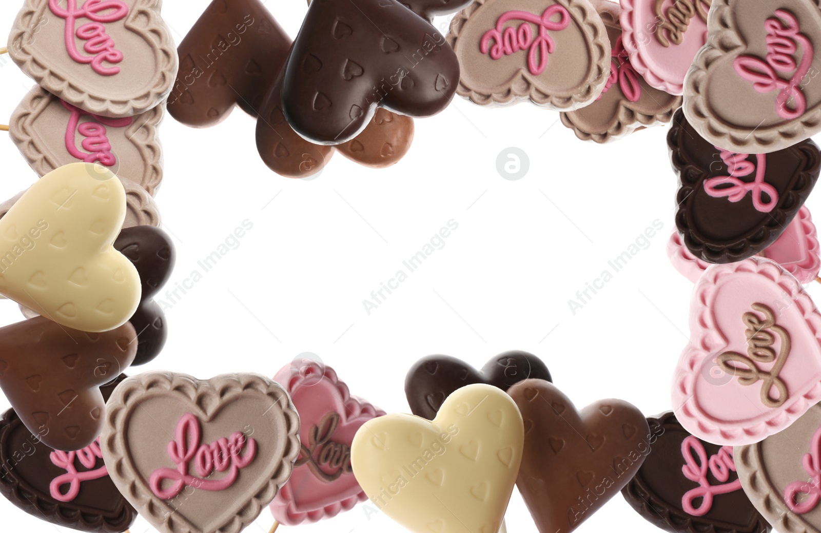 Image of Frame made of heart shaped chocolate candies on white background