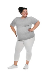 Photo of Happy overweight woman posing on white background