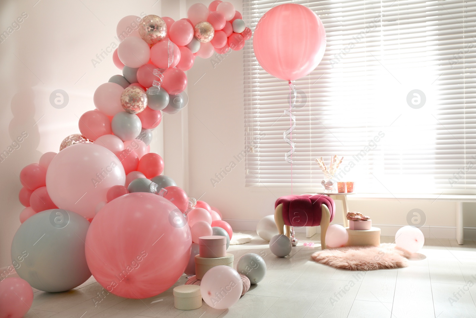 Photo of Room decorated with colorful balloons for party