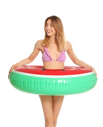 Beautiful young woman in stylish bikini with watermelon inflatable ring on white background