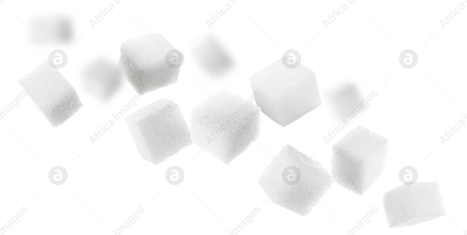 Image of Refined sugar cubes in air on white background