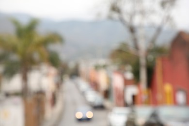 San Pedro Garza Garcia, Mexico – February 8, 2023: Blurred view of street with cars and beautiful buildings