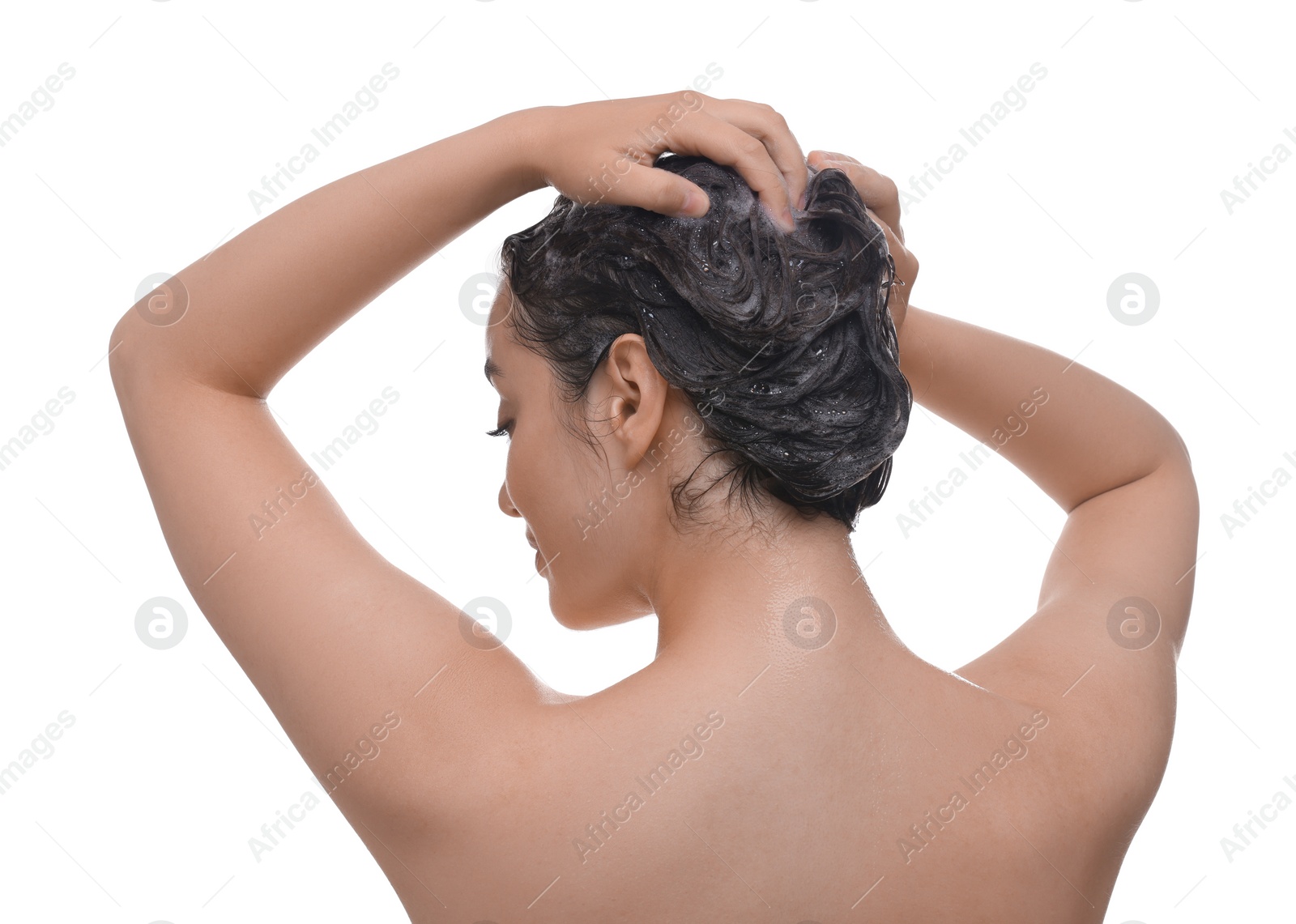 Photo of Woman washing hair on white background, back view