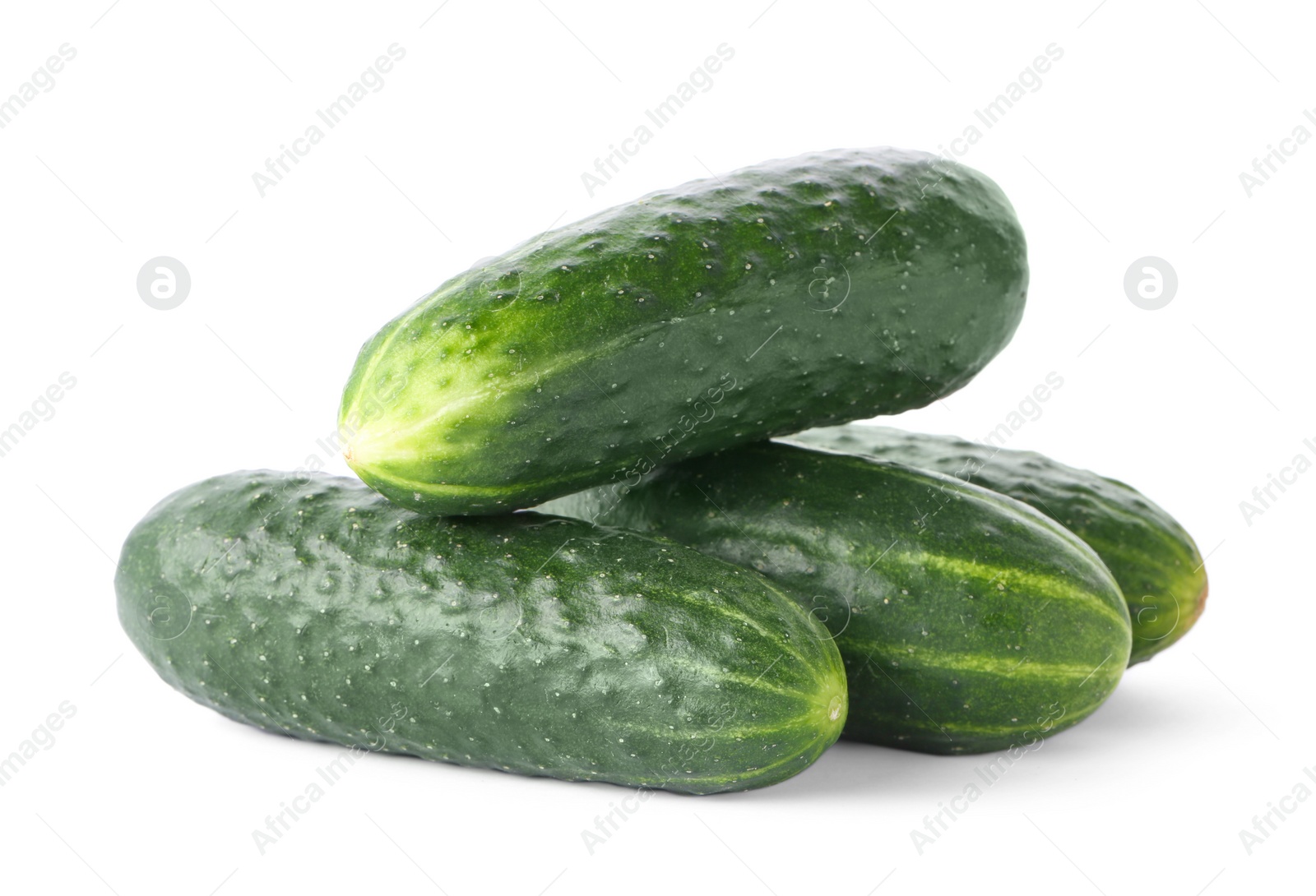 Photo of Fresh green cucumbers on white background