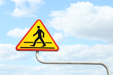 Photo of Traffic sign Pedestrian Crossing against blue sky. Space for text