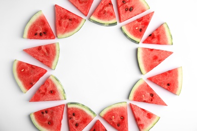 Photo of Frame made with slices of ripe watermelon on white background, flat lay. Space for text