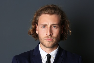 Portrait of handsome man on dark background