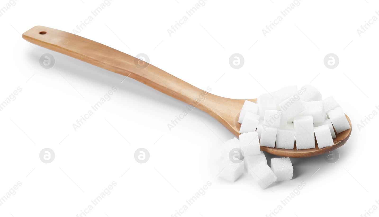 Photo of Sugar cubes and wooden spoon isolated on white