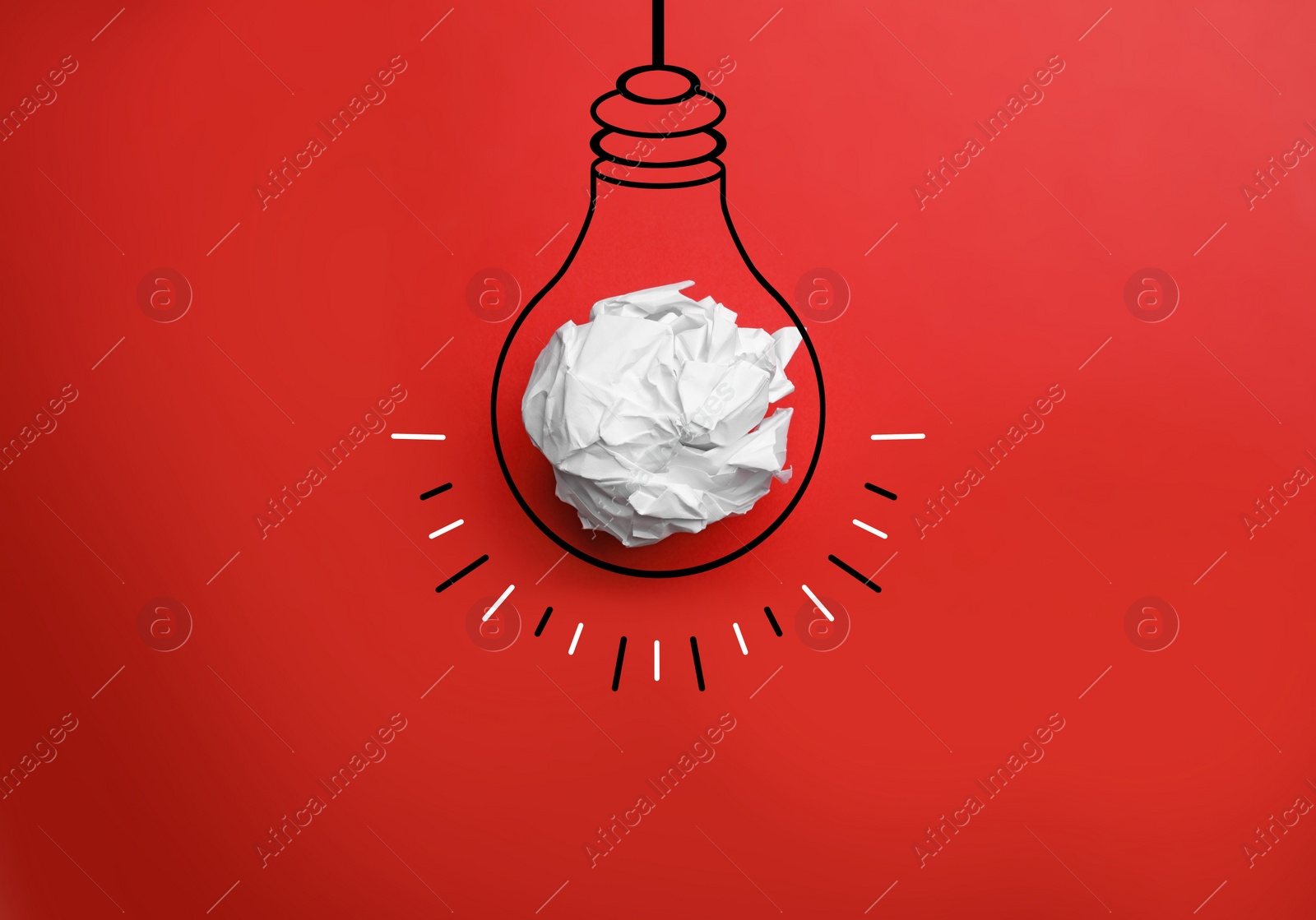 Image of Idea. Illustration of light bulb around crumpled paper ball on red background, top view