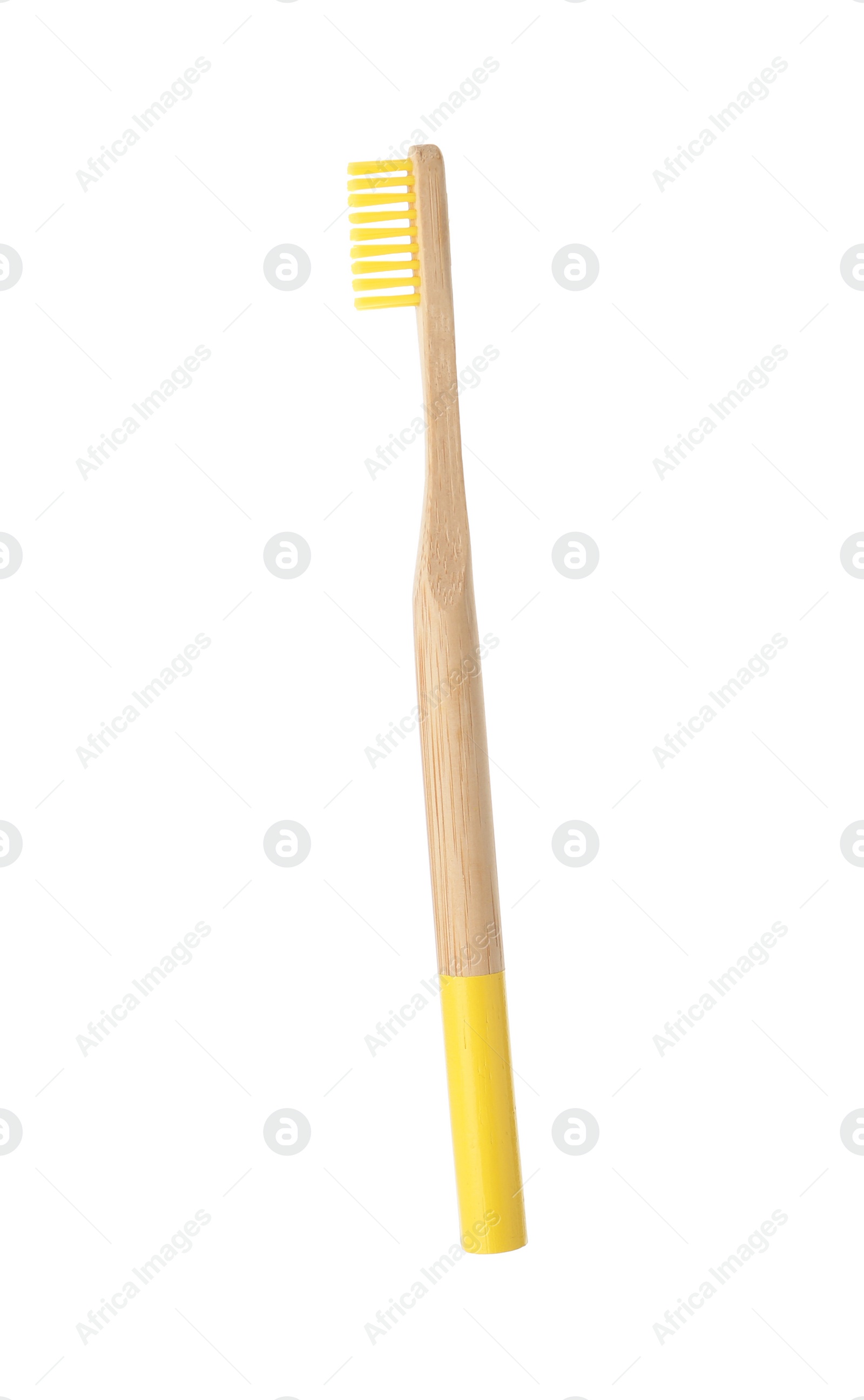 Photo of Bamboo toothbrush on white background. Dental care