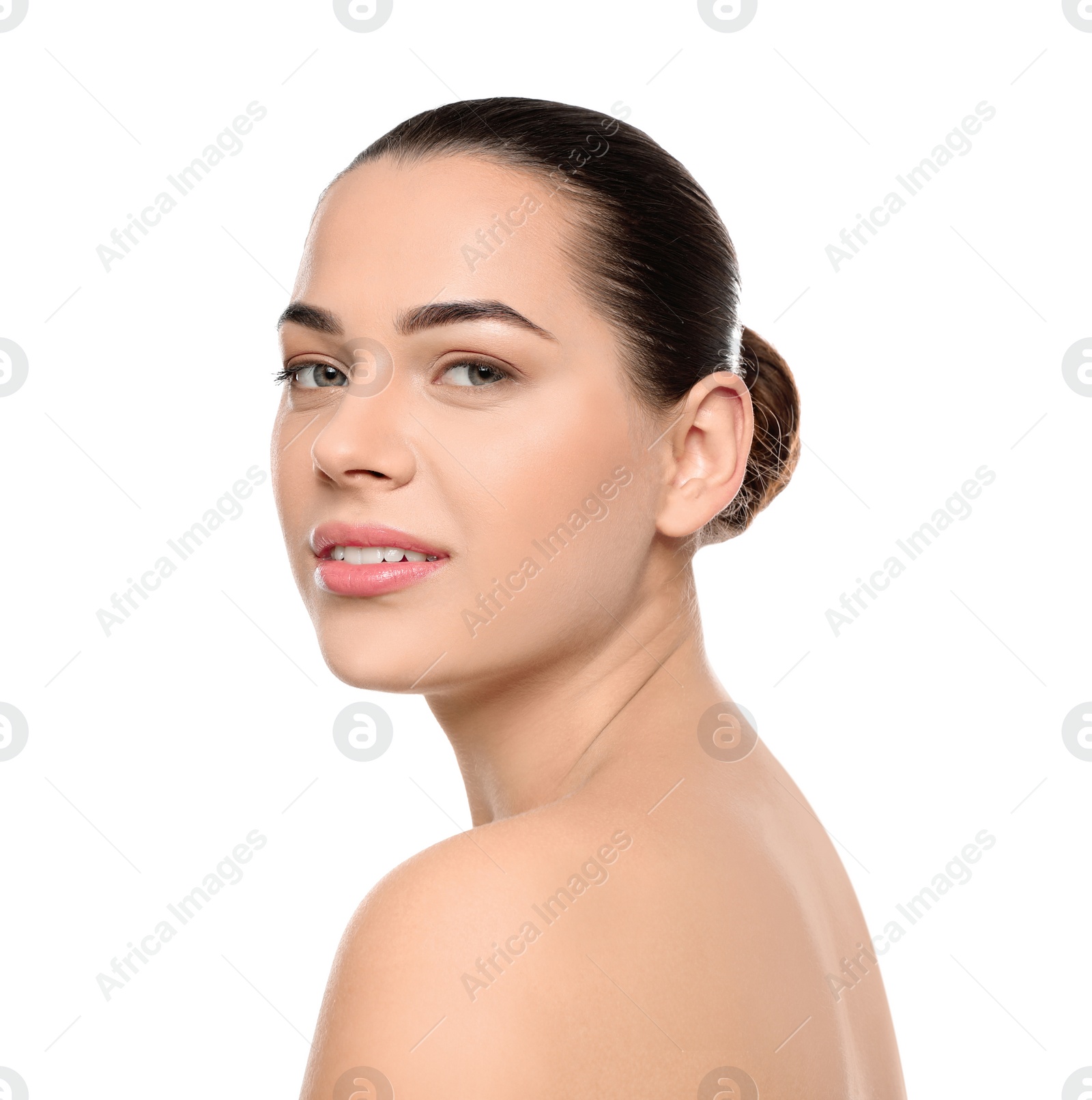 Photo of Portrait of young woman with beautiful face and natural makeup on white background