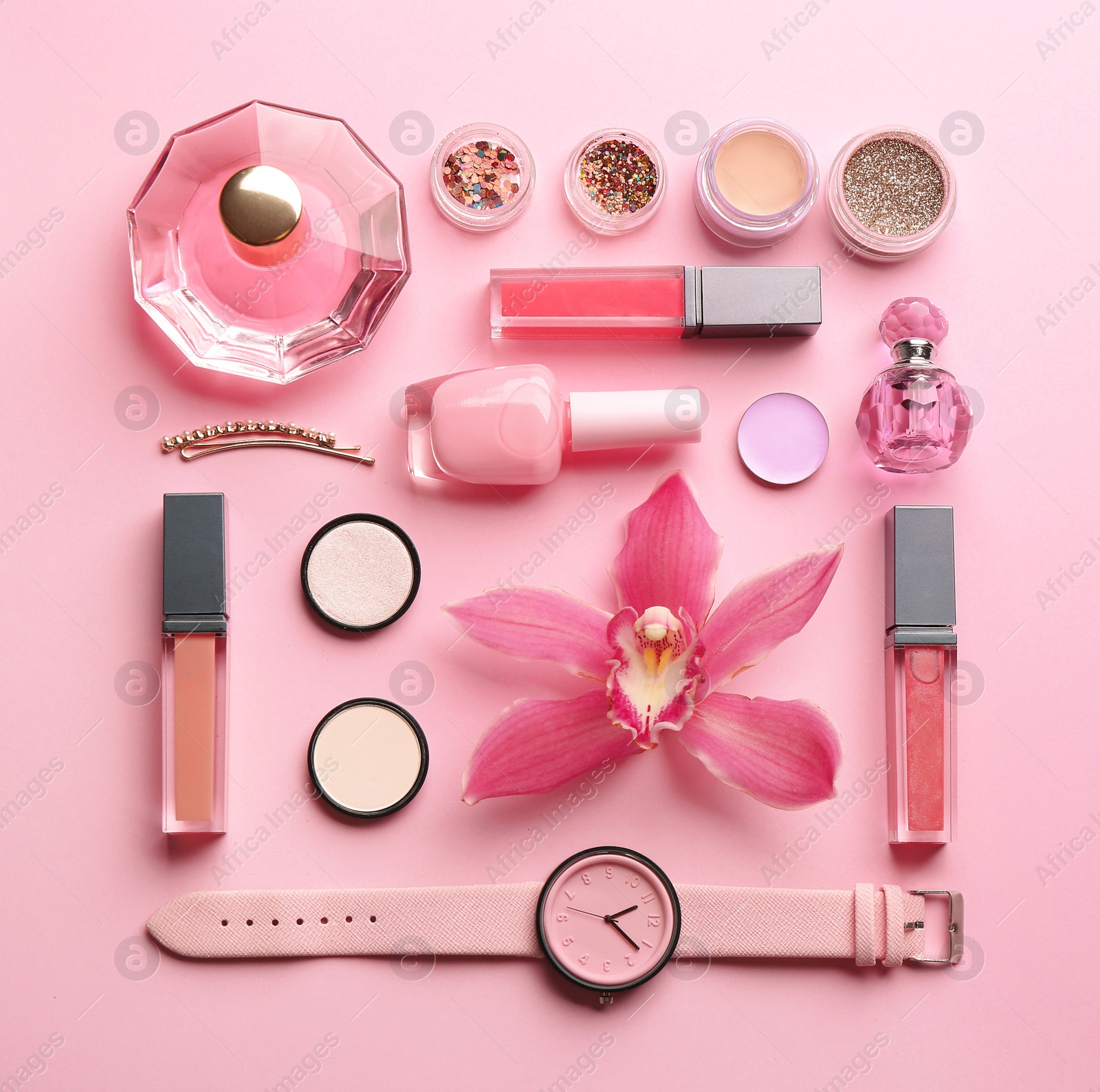 Photo of Flat lay composition with stylish female accessories and decorative cosmetics on color background