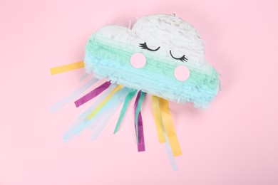 Bright cloud pinata on pink background, top view