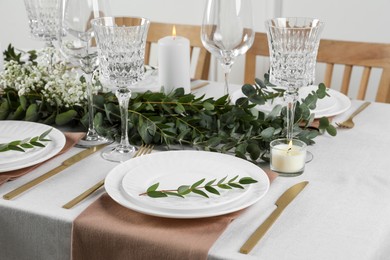 Stylish elegant table setting for festive dinner indoors