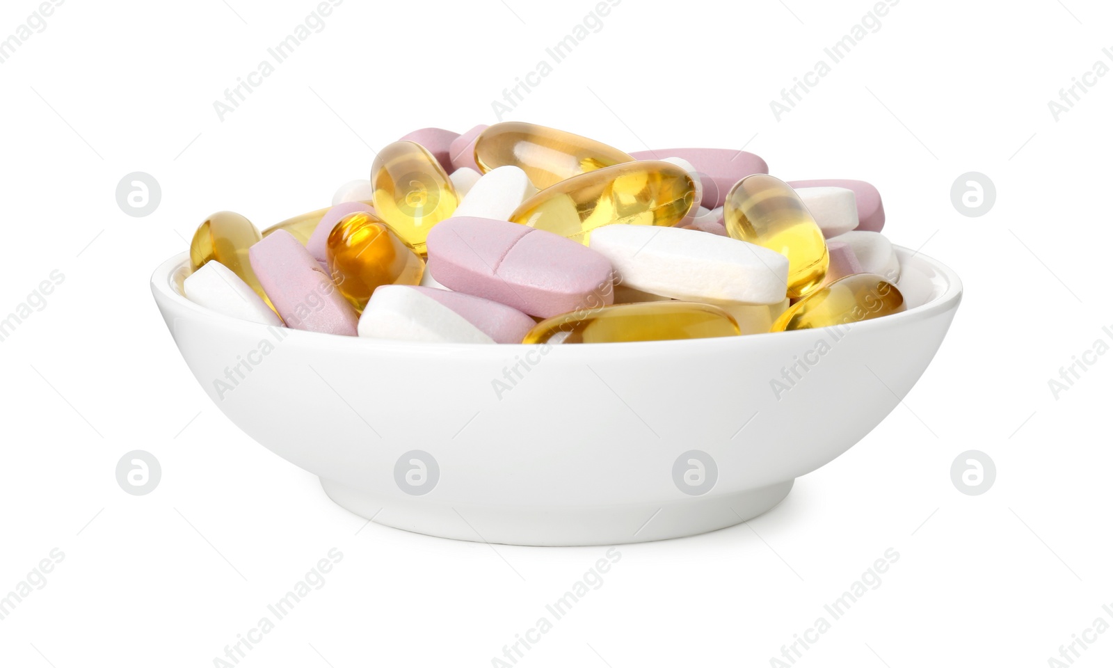 Photo of Different vitamin pills in bowl isolated on white. Health supplement