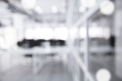 Image of Office interior. Blurred view of comfortable workspace