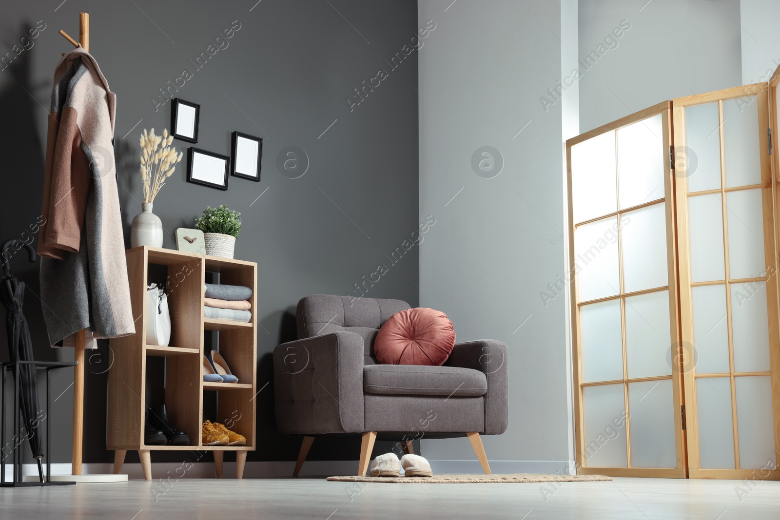 Photo of Modern hallway interior with stylish furniture and decorative elements, low angle view