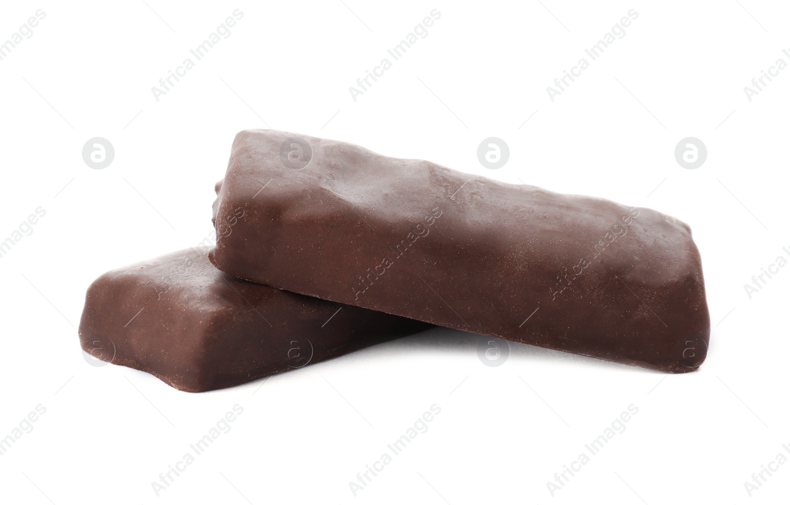 Photo of Tasty glazed protein bars on white background