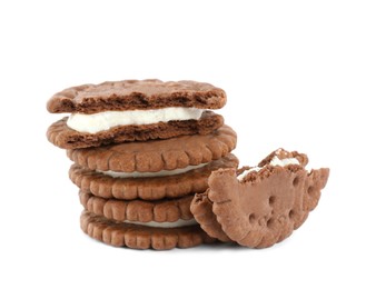 Photo of Tasty chocolate sandwich cookies with cream on white background