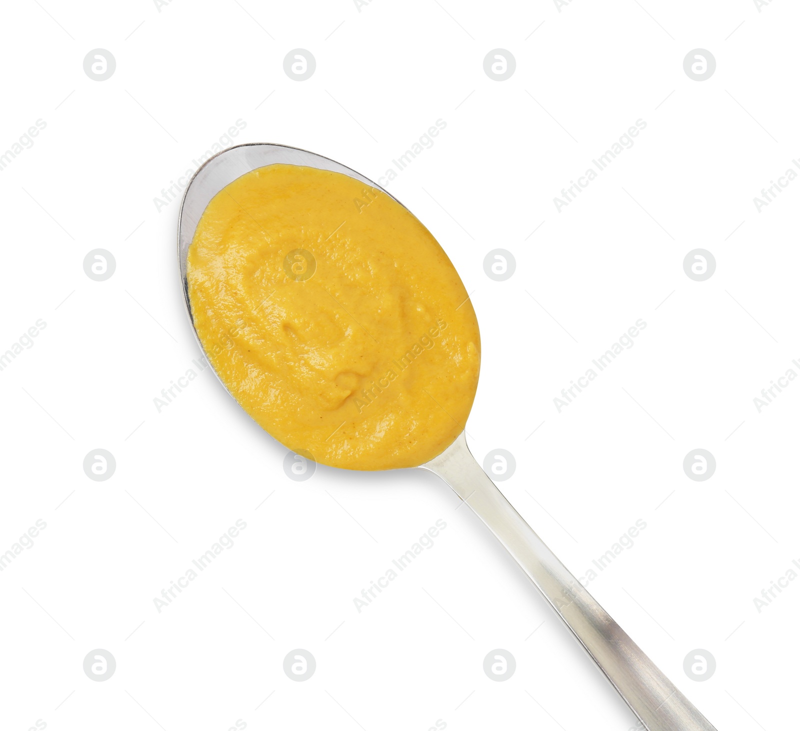 Photo of Tasty mustard sauce in spoon isolated on white, top view