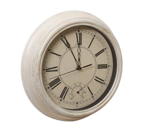 Photo of Stylish vintage wall clock showing five minutes until midnight on white background. New Year countdown