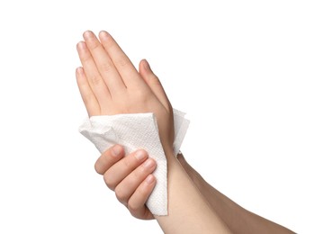 Woman wiping hands with paper towel on white background, closeup