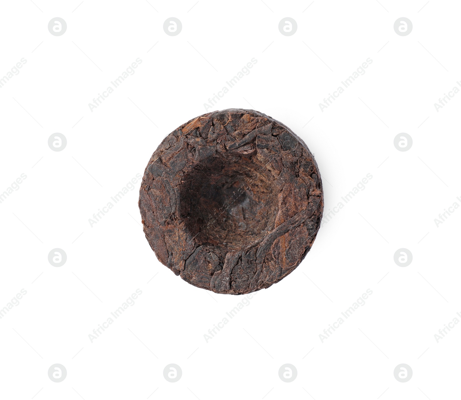 Photo of Cake shaped traditional Chinese pu-erh tea isolated on white, top view