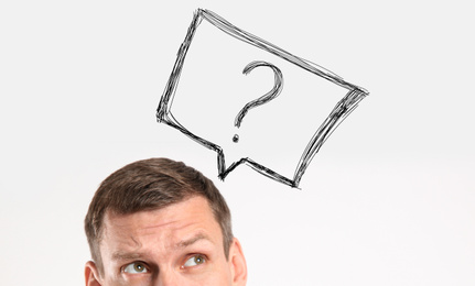 Image of Emotional man with drawing of question mark on white background