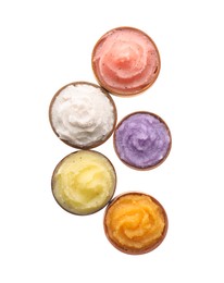 Photo of Different body scrubs in bowls on white background, top view