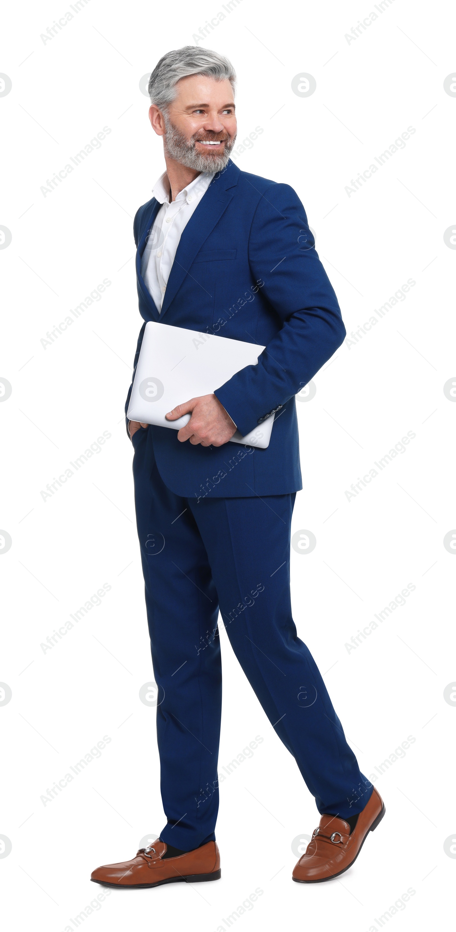 Photo of Mature businessman in stylish clothes with laptop on white background