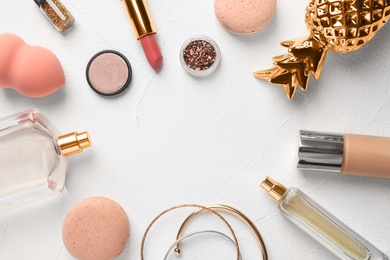 Photo of Flat lay composition with decorative cosmetics on light background