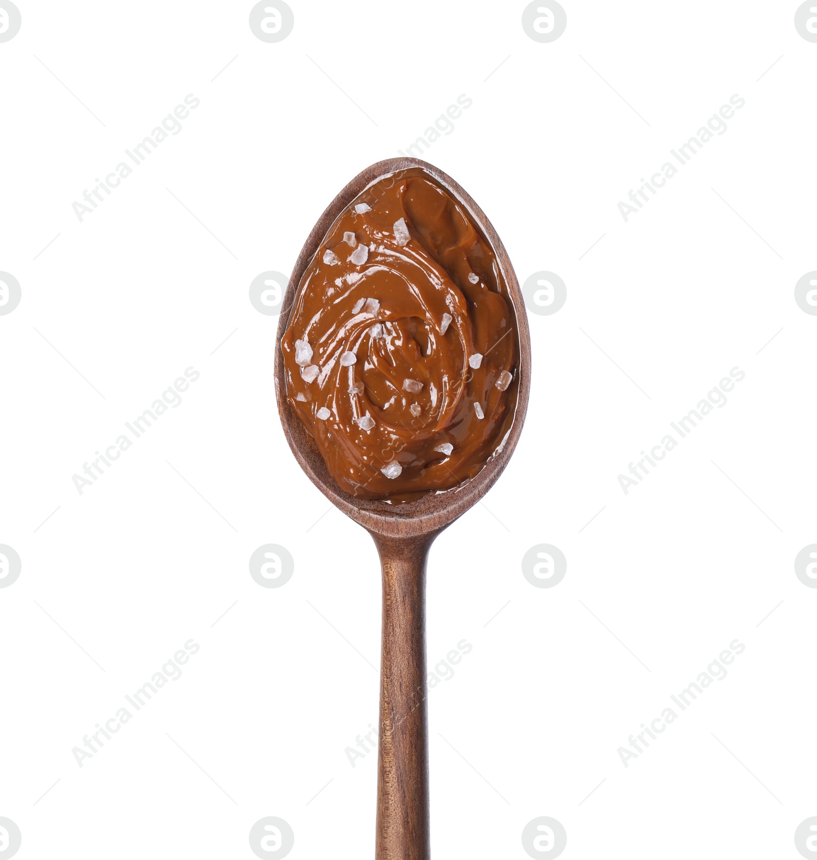 Photo of Salted caramel in spoon isolated on white