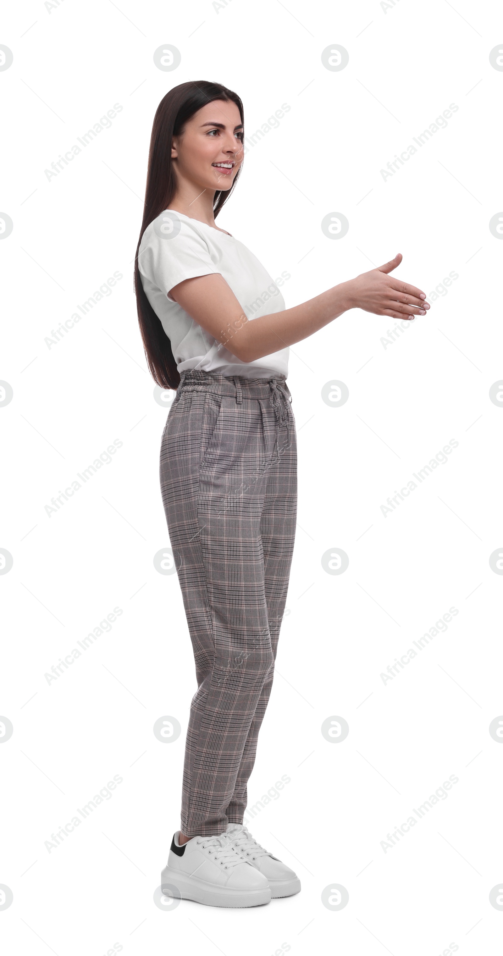 Photo of Beautiful young businesswoman standing on white background