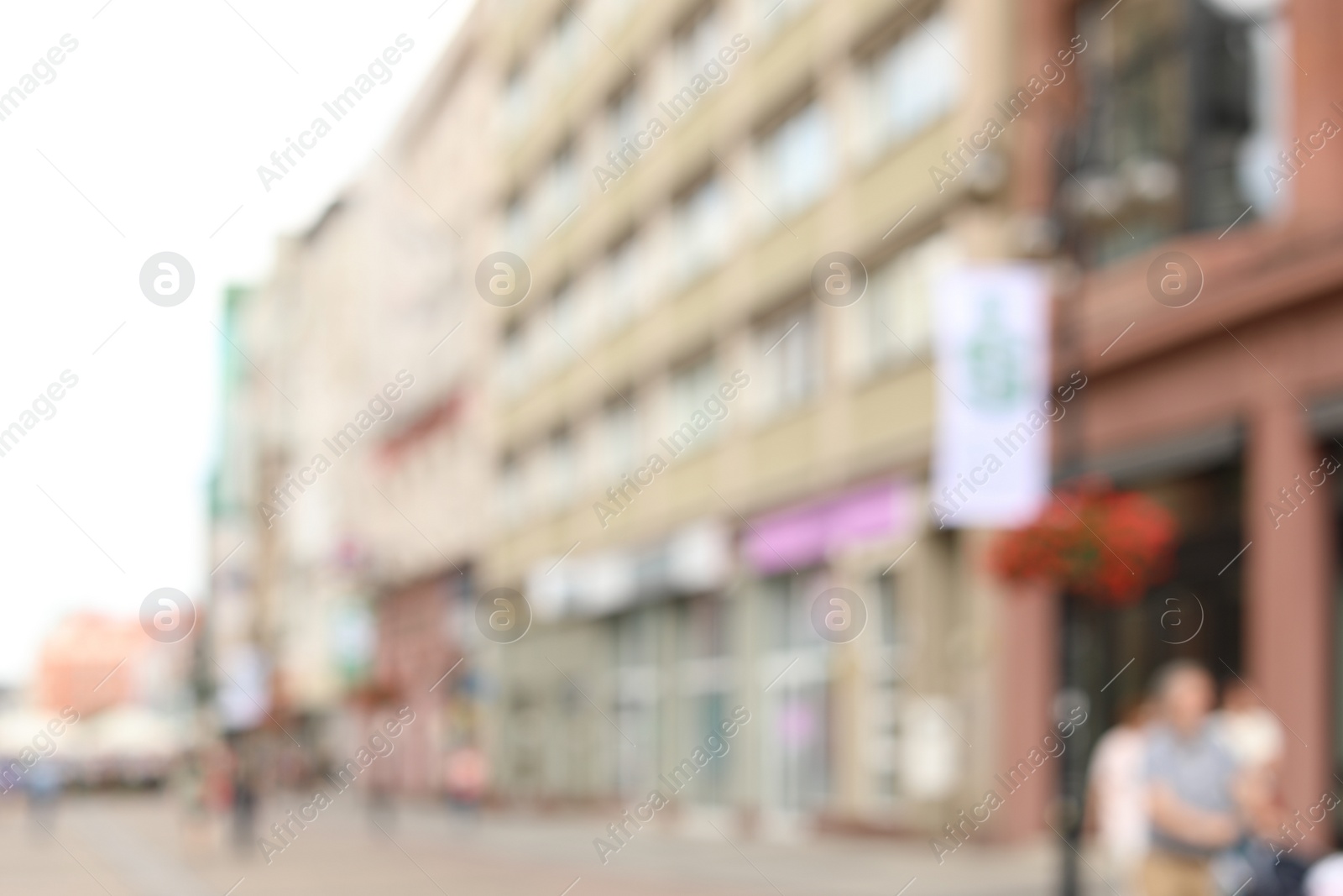 Photo of Blurred view of city street on sunny day