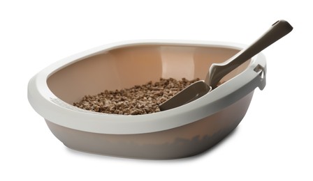 Photo of Beige cat litter tray with filler and scoop isolated on white