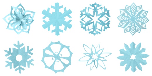 Image of Set of beautiful paper snowflakes on white background. Banner design 