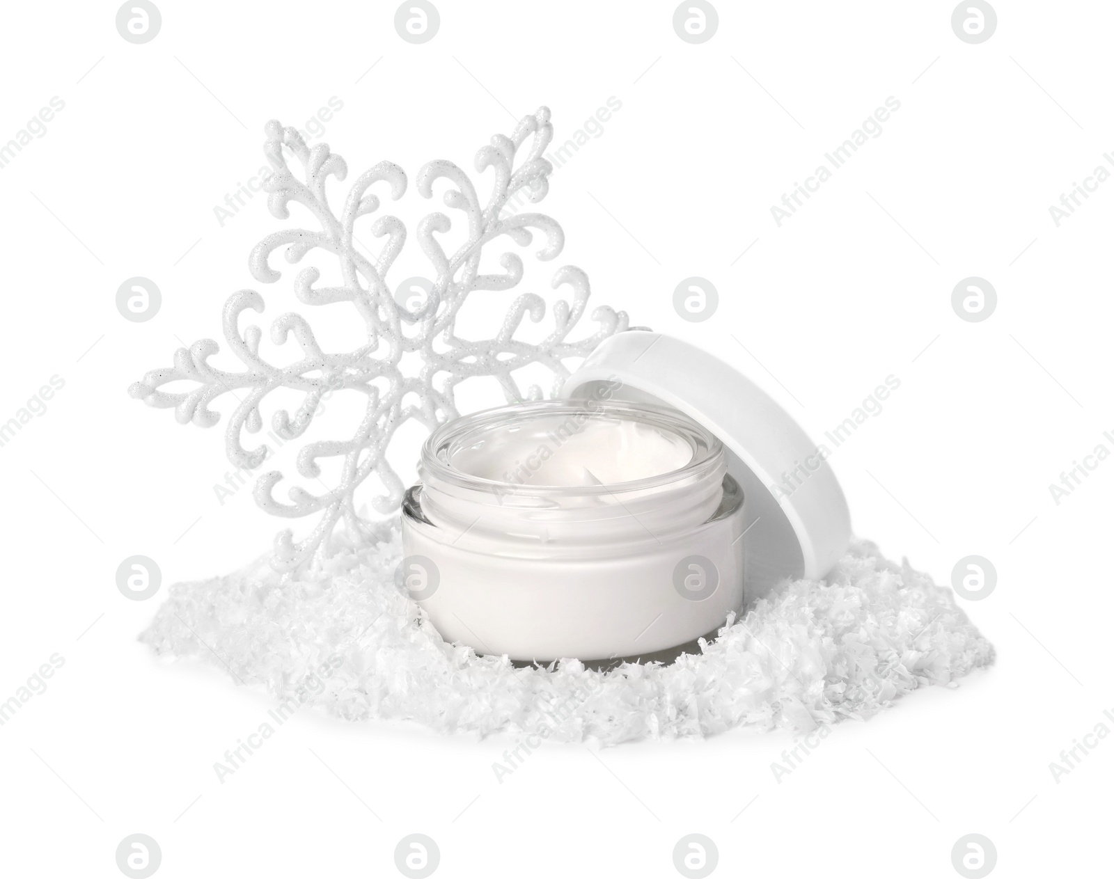 Photo of Jar of hand cream and Christmas decor isolated on white. Winter skin care