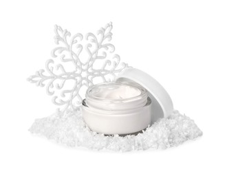 Photo of Jar of hand cream and Christmas decor isolated on white. Winter skin care