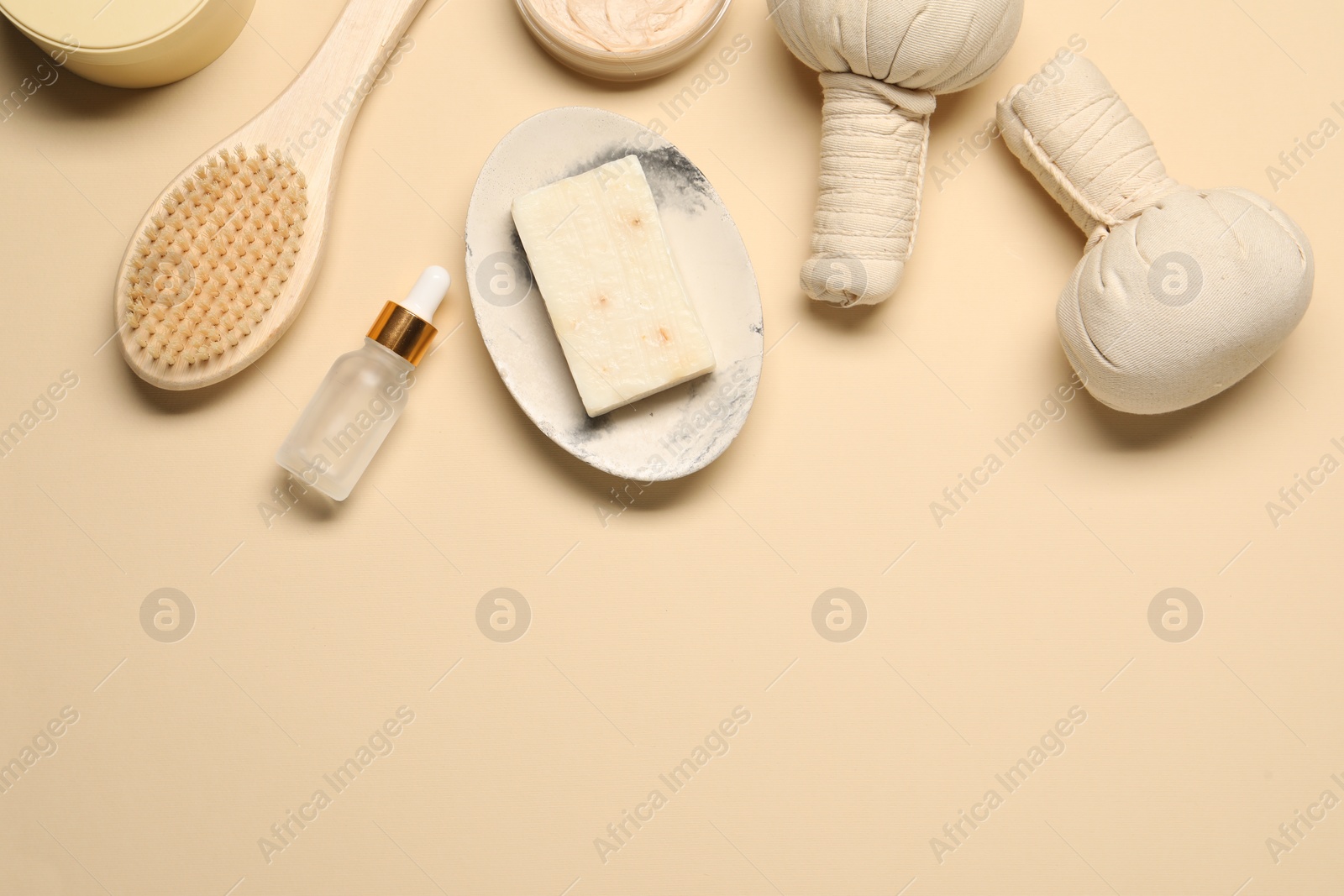 Photo of Bath accessories. Flat lay composition with personal care products on beige background, space for text