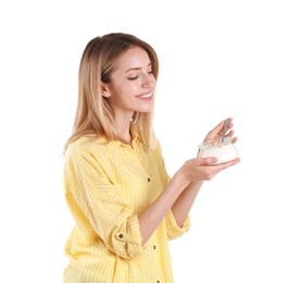 Photo of Young attractive woman eating tasty yogurt on white background