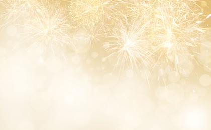 Abstract festive background with fireworks, bokeh effect. New Year celebration