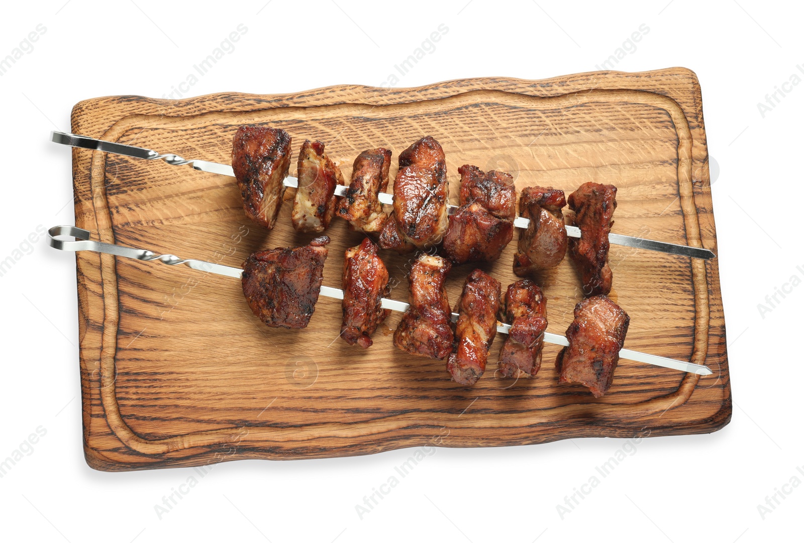 Photo of Metal skewers with delicious shish kebabs isolated on white, top view