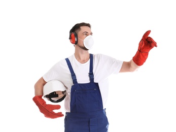 Photo of Male industrial worker in uniform on white background. Safety equipment