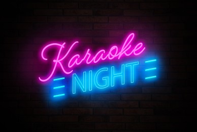 Illustration of Glowing neon sign with words Karaoke Night on brick wall