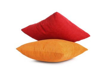 Different colorful decorative pillows on white background