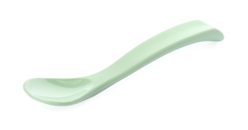 Plastic spoon isolated on white. Serving baby food