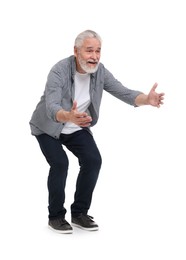 Senior man greeting someone on white background